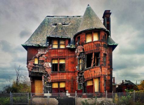 Crumbling despair: Once a home for the rich, a Detroit house teeters on the brink of collapse.