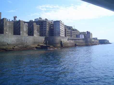 At its peak in 1959 the population on Hashima was 5,259 people, with a population density of 216,264 people per square mile. For comparison, 2011 Hong Kong has a population density of about 17,000 people per square mile.