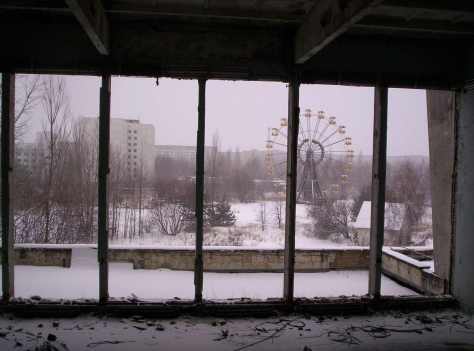 The gloomy view of a forsaken amusement park, void of all humanity.  